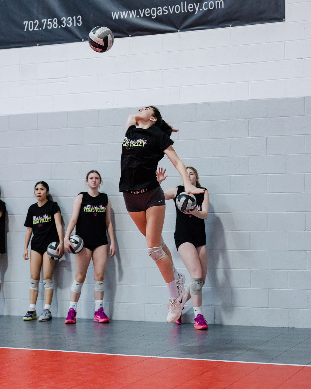 Volleyball Serve Types: When you're looking to add power and pace to your serving game, the jump float serve can be a reliable go-to that you have in your serving toolbox. (Amber left side hitter jump float serving)