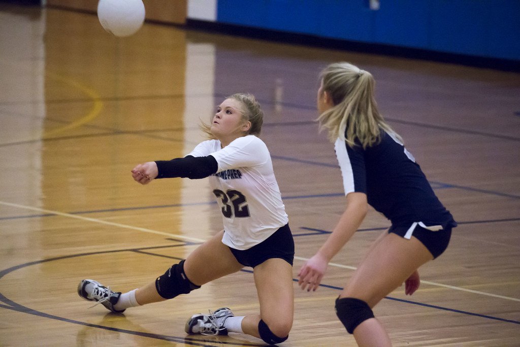 The libero volleyball player plays through the back row, then when they get to zone four (4) they come out of the game to let their middle blockers play the front row. (Keith Allison photo)