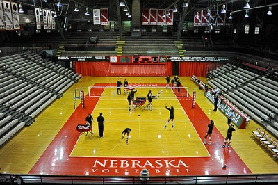 2017 NCAA Champion Nebraska Huskers court - photo by Manoosh - These questions about basic volleyball rules usually concern queries about what the various lines on the court mean, what's legal and allowed when contacting the ball, and what is illegal when touching or not touching the ball when competing, how does scoring work, and much more.