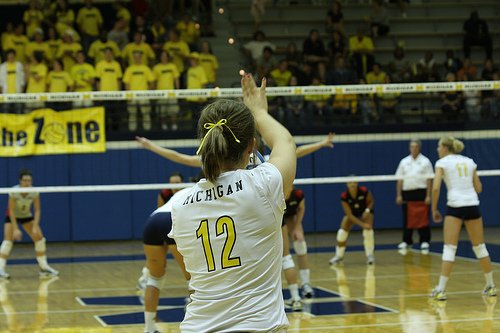 How To Serve In Volleyball:To develop a tough serve you need to decide early where to serve and then attack the ball with your serve in order to improve how to serve in volleyball. (Sarah Worsham)