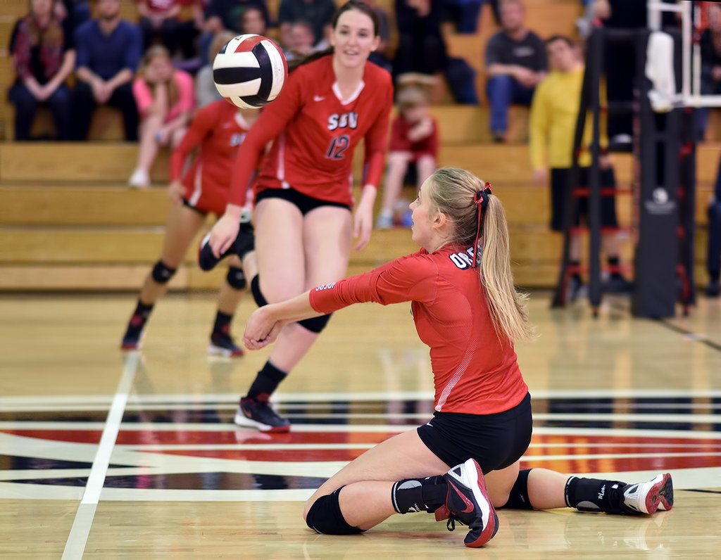 Make a volleyball platform with your forearms by clasping your thumbs together pointing them to the ground so ball contacts above the wrists and below elbows. (Al Case)