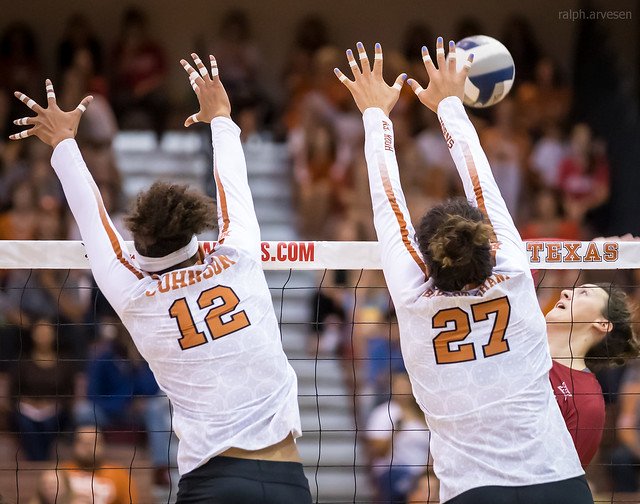 This volleyball blocking tip describes the importance of watching the hitter. (Aversen)