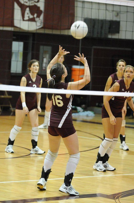 This volleyball setter training reviews step-by-step each body part and what it does so you learn how to correct your mistakes and improve your setting skills. (photo by Dan Morgan)