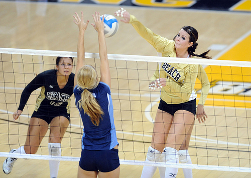 Spiking the ball is a high speed attack option for a player who's sending the third contact over the net and into the opponent's court with the intent of scoring a point or sideout for their team.