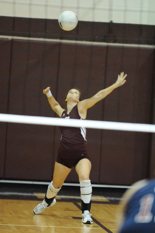 A step up from the underhand serve, the overhand serve involves tossing the ball up and striking it with a lot of force. This serve style can send the ball to the opponent's court much faster and is a commonly used serve in competitive volleyball.(volleyballserver-serve-front-row-dan-morgan)