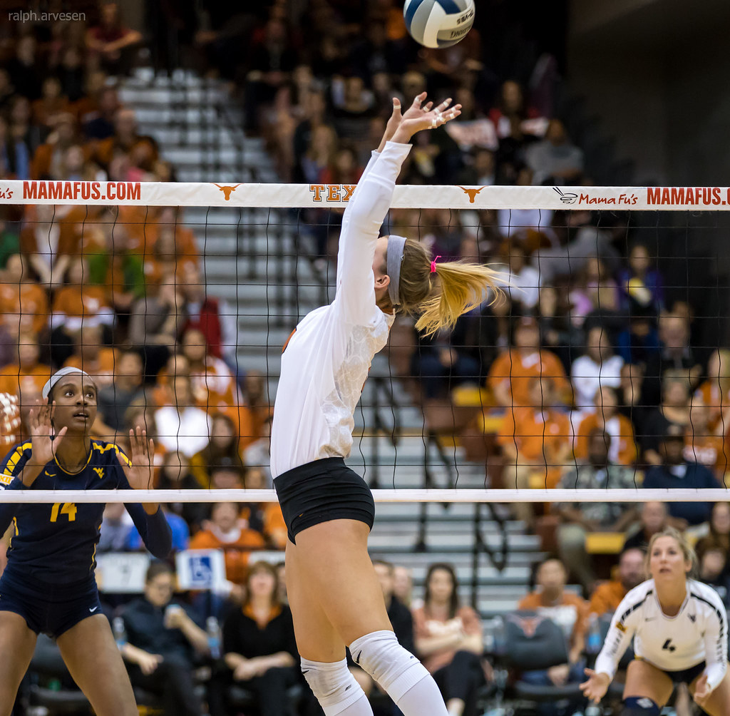 Inspirational Volleyball Quotes For Setters: Fuel Your Passion and Optimize Your Performance with this collection of quotes from college coaches. (photo volleyball setter backset slide set texas longhorn by ralph arvesen)