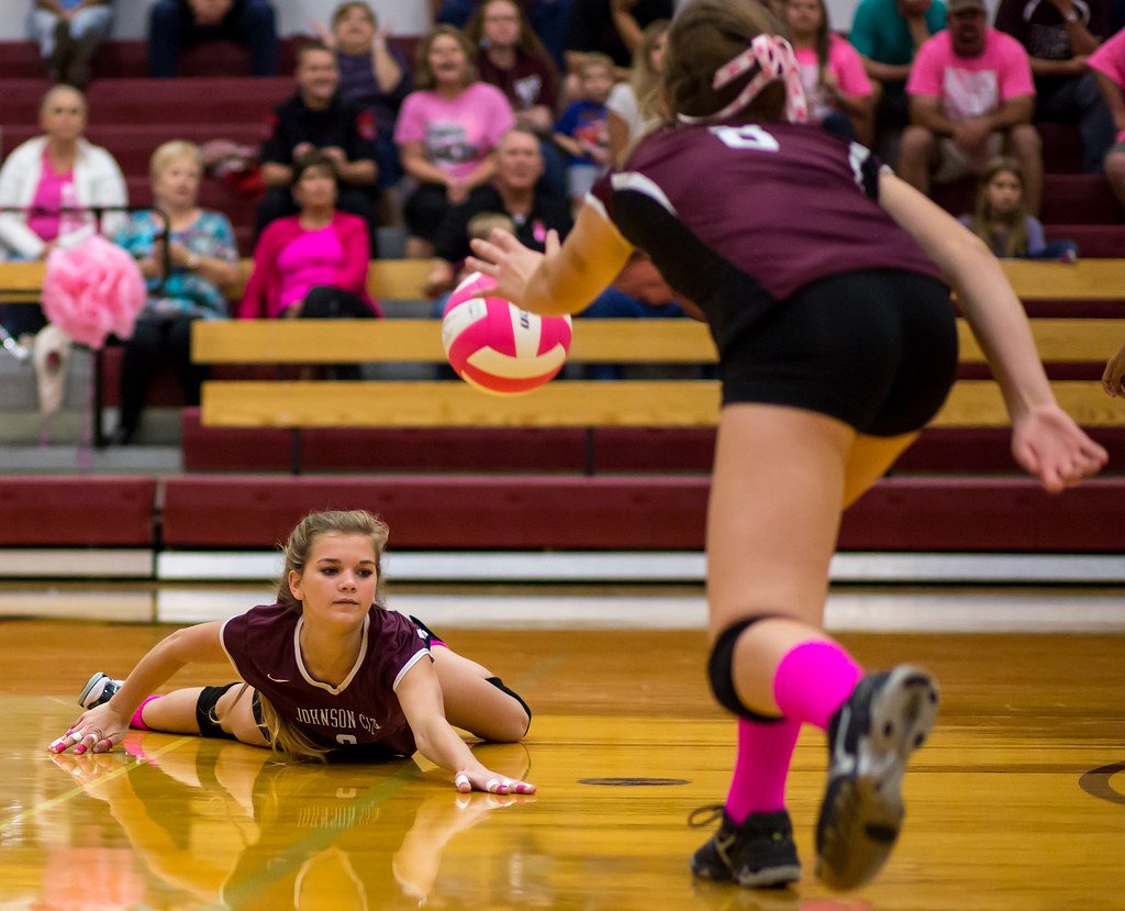 Volleyball Dig Definition: With a very flat hand well-placed under the ball on the floor, the ball will bounce straight up from your hand, as if it contacted the floor.  (Aversen)