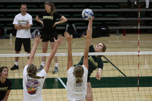 Volleyball Attacking: if you choose to hit the ball hard, after taking your spike approach to the ball and jumping in the air to hit it, that's called a spike. (Shaun Calhoun)